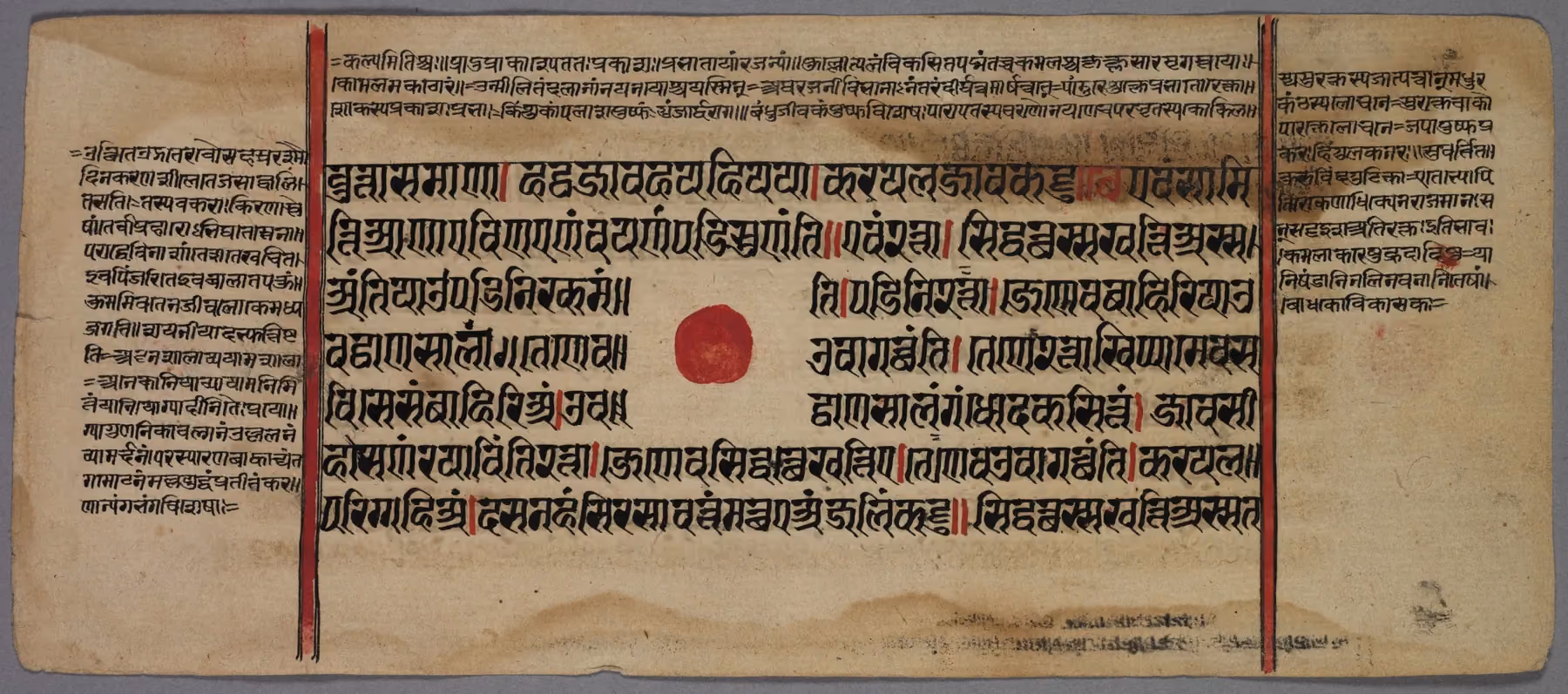 A narrow palm-leaf-format page from a fifteenth or sixteenth century Jain manuscript, with miniature painting and script
