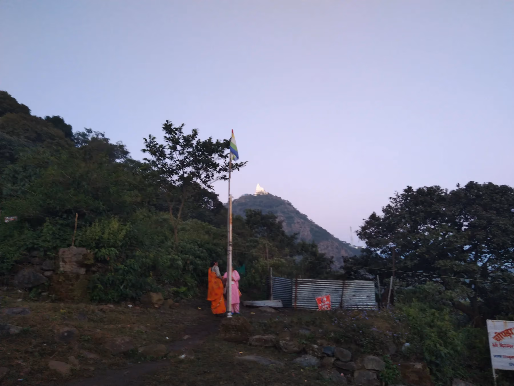 A shrine on the forested ridge of Parasnath Hill at Shikharji, seen from a distance